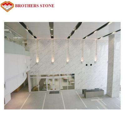 China A pedra de mármore branca telha lajes para projetos da casa de campo do hotel da parte alta à venda