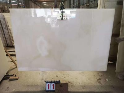 China 15mm Thickness Snow White Onyx Marble With Red Veins for sale
