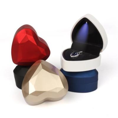 China baking varnish Heart Shaped Jewelry Box Painted Rubber With Small LED Light for sale
