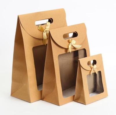 China Bow - Knot Die Cut Handle Kraft Packaging Bags With Opening Window Brown Stand Up Pouch for sale