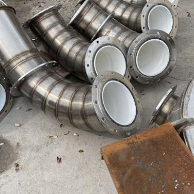 China Alumina Ceramic Lined Pipe Elbows 88-96.5 HRA High Mechanical Strength for sale
