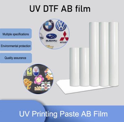 Κίνα Καλύτερη εκτυπωτών UV DTF αβ ταινιών κρυστάλλου ετικετών επίπεδης βάσης ταινία μεταφοράς θερμότητας μελανιού εκτυπωτών άσπρη προς πώληση