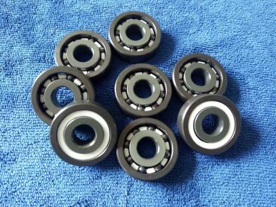 China 6200 Type High Speed Ceramic Ball Bearings P4-P6 Precision Grades White Or Black for sale