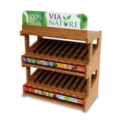 China Counter Top Cosmetic Display Stand Essential Oil Wooden Display Rack With Custom Logo for sale