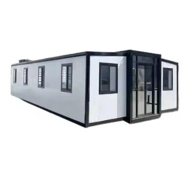 China 40ft Double-Wing Expansion Container House with Design and EPS Sandwich Panel Roof for sale