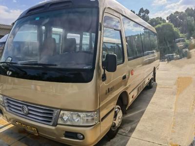 China Used Small Bus 28 Seats Front Engine 7 Meters Air Conditoner 5250kg Curb Weight 150hp Golden Dragon XML9729 en venta