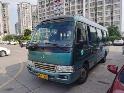 China 2015 años 26 Dragon Coaster Bus de oro usado asientos, motor usado de Mini Bus Coaster Bus With Hino en venta