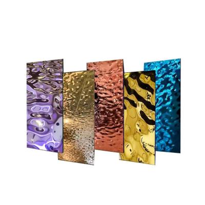 China Coloridas ondulaciones de agua de oro decorativo de acero inoxidable 304 placa de pared de metal en venta