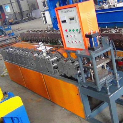 China Rolling Shutter Roll Forming Machine / Door Frame Making Machine With Different Colors for sale
