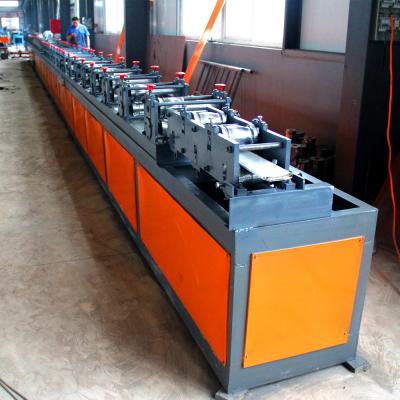 China PPGI  PU  Foam Roller Shutter Door Roll Forming Machine With PLC Controled for sale