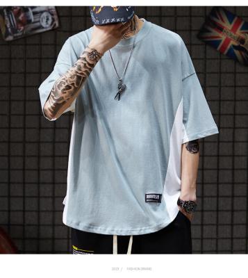 Cina T-shirt oversize da XS a XXL con spalle scoperte in cotone tinta unita per uomo in vendita