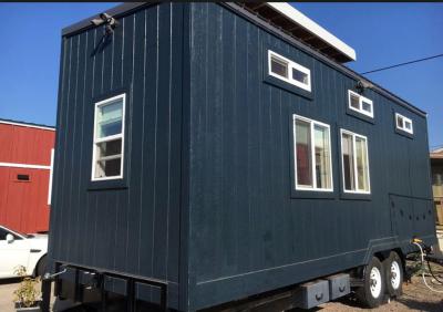 China OEM Custom Tiny House Prefabricated / Fully Furnished Tiny Homes With Trailer Wheel for sale