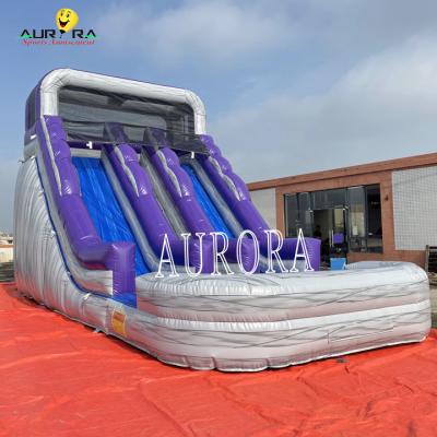 China Custom Purple Gray Inflatable Water Slide With Climbing Wall For Adventure Seekers for sale