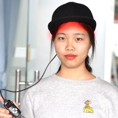 中国 広範囲レーザー赤いLEDのヘルメット、毛の成長のための150のLEDライト帽子 販売のため