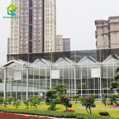 China Commercial Agricultural Glass Greenhouse For Flowers Potatoes Tomatoes Peppers for sale