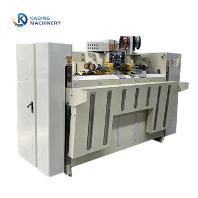 China Máquina de costura de la caja acanalada semi automática con la alimentación de papel de la succión del vacío para la fabricación de cajas en venta