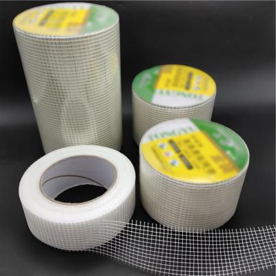 China Standard Self Adhesive Glass Fiber Mesh Tape White Color For Walls Cracks for sale