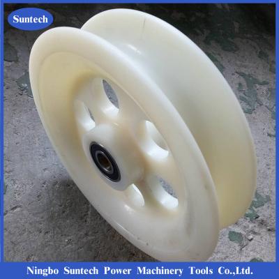 China Conductor de ruedas de polea de nylon que ata el bloque de polea de tracción con rodamientos de bolas en venta