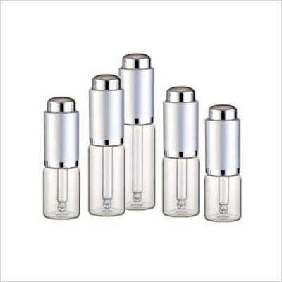 China casquillo de plata cosmético del dropper de la prensa de la botella de cristal de 7ml 8ml 10ml 12ml 15ml en venta
