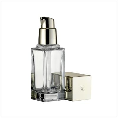 China Quadrat-kosmetische Glasflaschen-Goldpumpen-Kappen-leere Glasgrundlagen-Flasche 20ml 30ml zu verkaufen