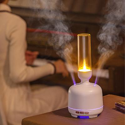 China Two Spray Port Essential Oil Diffuser Changeable LED Light Aromatherapy Scent Diffuser Machine Candle Mini Humidifier for sale