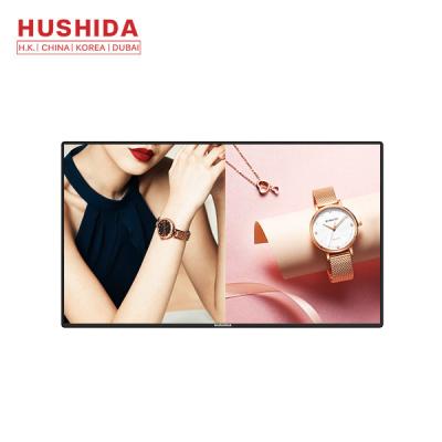 China 1.5ghz Wall Mounted Advertising Display 75'' Hushida Software Split Screen Timing Switch for sale