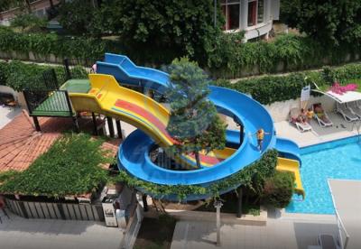 China OEM Swimming Pool Water Slide Fade Resistant Fiberglass Spray Ground Pool Slide for sale