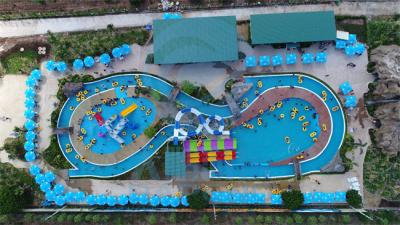China El parque perezoso del agua de río del OEM 4000 Sqm modificó para requisitos particulares con las diapositivas de la piscina en venta