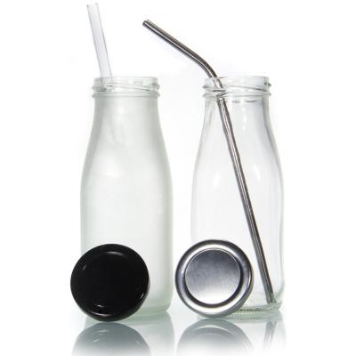 China OEM Kombucha Botellas de leche de vidrio Contenedores de jugo de vidrio con tapas en venta
