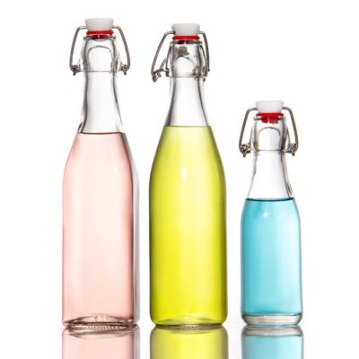 China ODM Restaurant 12 Oz Glass Juice Bottles Glass Jar With Hermetic Lids for sale