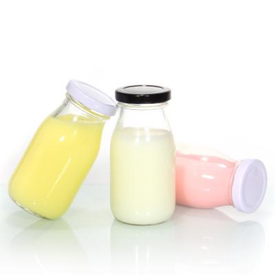 China Botellas de leche mini con grabado de etiqueta personalizada para café frío en venta