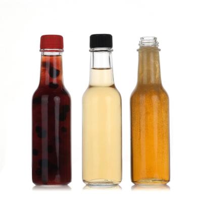 China Woozy Square Glass Juice Bottles Empty Glass Ketchup Bottle 10 Oz for sale