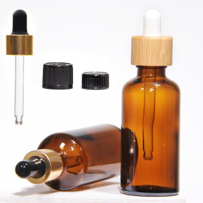 China Customized Hot Stamping 2oz Glass Dropper Bottles With Stainless Steel Lid for sale