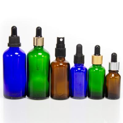 China Ámbar vacío 2 oz botellas de goteo tintura para aceite esencial en venta
