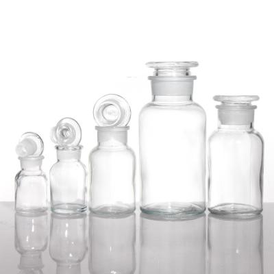 Китай Широкоугольный янтарный стеклянный лекарственный бутылки оптом для таблеток Химический реагент 250 мл 500 мл продается