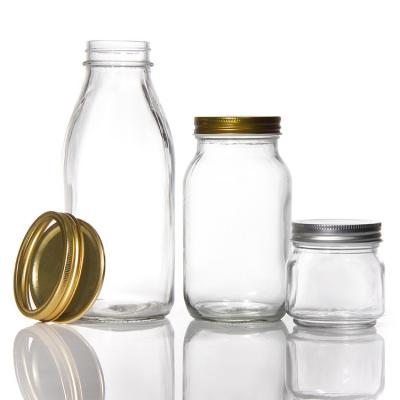 China Envases de vidrio con etiqueta personalizada, claros 4 oz 450 ml 250 ml con tapas en venta