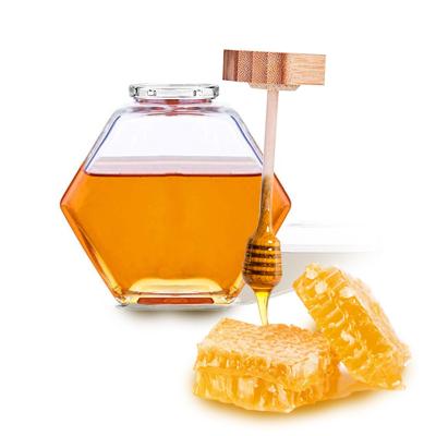 China 4 oz Hexagonal Vidrieras de miel vacías Grado alimenticio a granel con tapas de madera en venta