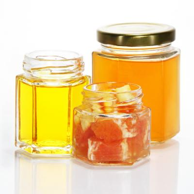 China 45ML Bulk Mini Muth Honey Jars Food Storage With Metal Lid for sale