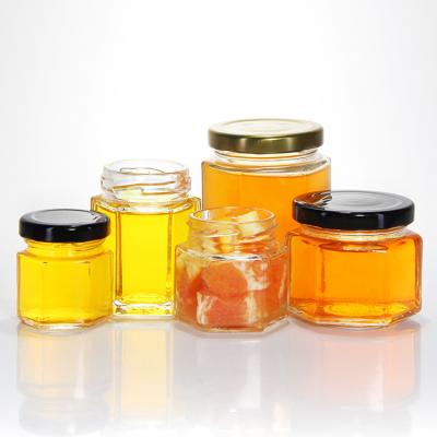 China Personalized Hex Glass Honey Jars 4 Oz 8 Oz Transparent for sale