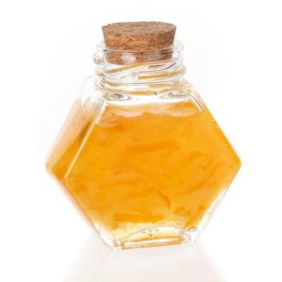 China 250g 350g Glass Honey Jars Hexagon Bee Shaped 8 oz for sale