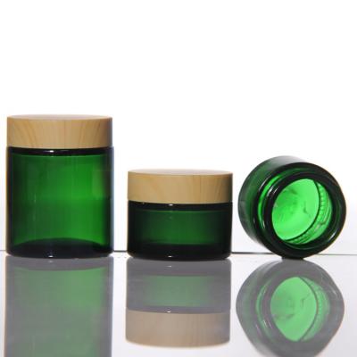 China 20g 100g Acacia Lid Glass Jars Amber Storage Jars Custom for sale