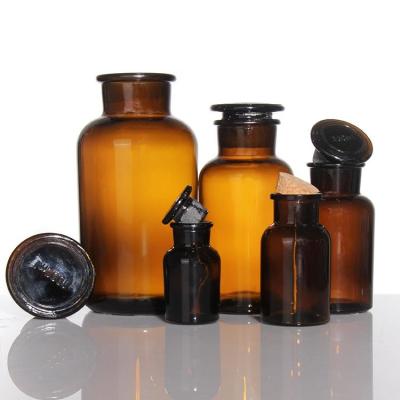 China Op maat gemaakte 125 ml Amber Wide Mouth Reagent Flasje Vintage Glas Apothecary Jar Te koop