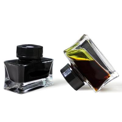 China 15 ml de pluma de botella de tinta de vidrio cuadrada plana separada con tapa negra en venta