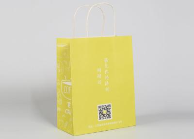 China El papel torcido maneja los bolsos de compras de encargo para el embalaje del regalo y de la ropa en venta