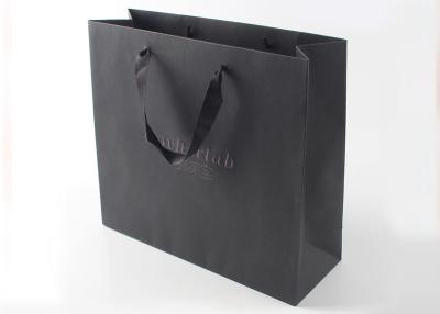 China Luxury Style Printed Paper Shopping Bags Recyclable With Grosgrain Ribbon for sale