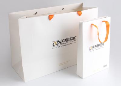 China Decorative Fancy Folding Gift Packing Bags Logo Printed For Beauty Equipment for sale