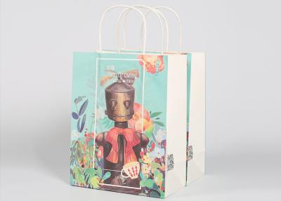 China el embalaje del regalo del papel de 120GSM Kraft empaqueta el celofán con las manijas de papel torcidas en venta