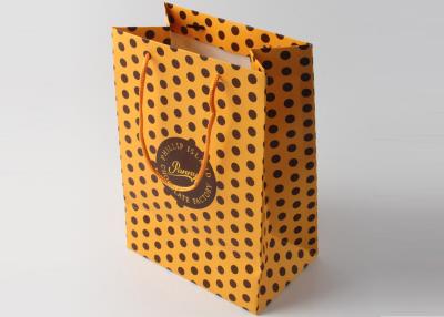 China Nylon Handle Decorative Gift Packing Bags With Gold Foil Hot Stamp And Dot Pattern for sale