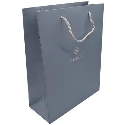 China 250gsm Cardboard Paper Shopping Bags Pantone 4C Offset With Handles for sale