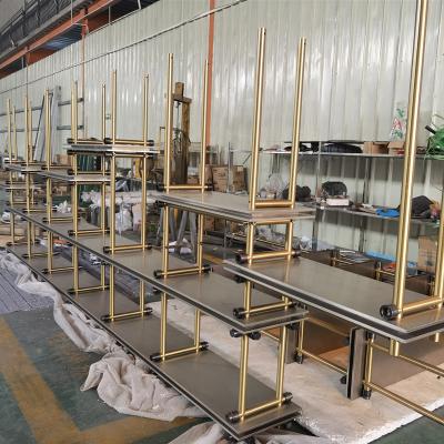China Wholesale Boutique Shop Gold Color Stainless Steel Rack Metal Lingerie Store Display Rack for sale
